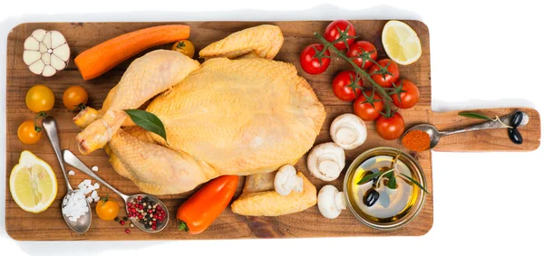 View from above of uncooked  chicken ready to roast with cooking — Stock Photo, Image