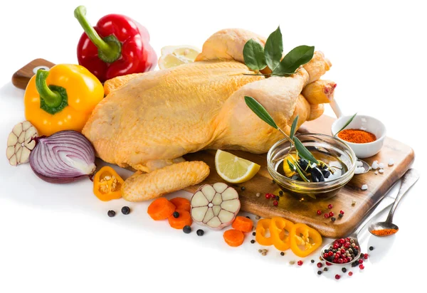 Uncooked chicken with vegetables — Stock Photo, Image