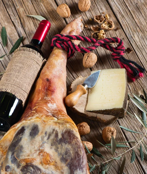 Ham, wine, walnuts and cheese, top view — Stock Photo, Image