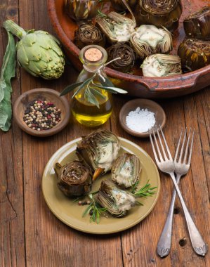 Artichokes,  olive oil and spices clipart