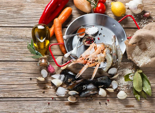 Seafood and vegetables for paella — Stock Photo, Image