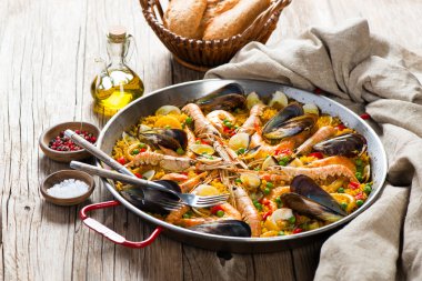 Typical spanish seafood paella clipart