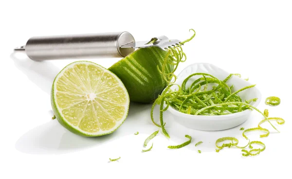 Peeling a lime — Stock Photo, Image