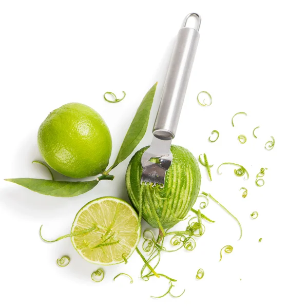 Lime zesting, view from above — Stock Photo, Image