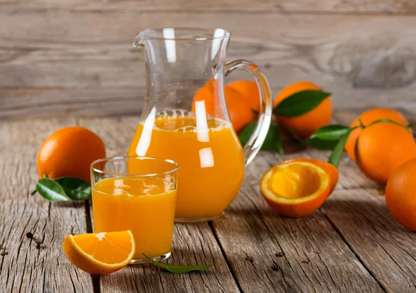 Oranges and orange juice — Stock Photo, Image