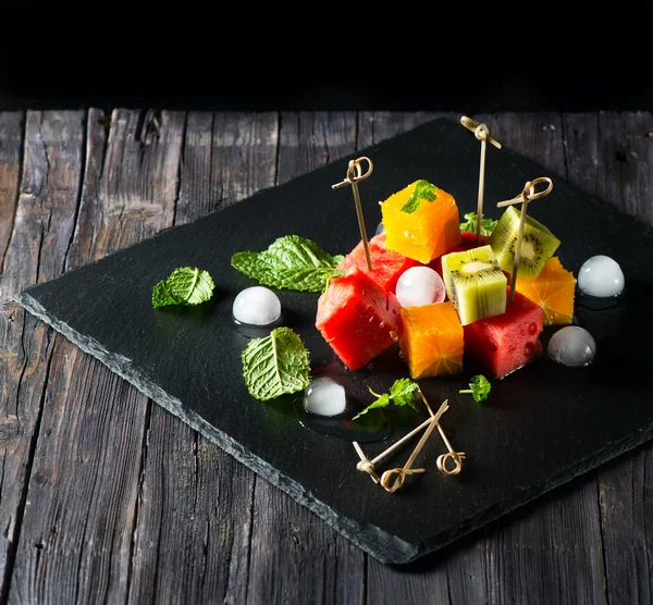 Salad with different kinds of fruits — Zdjęcie stockowe