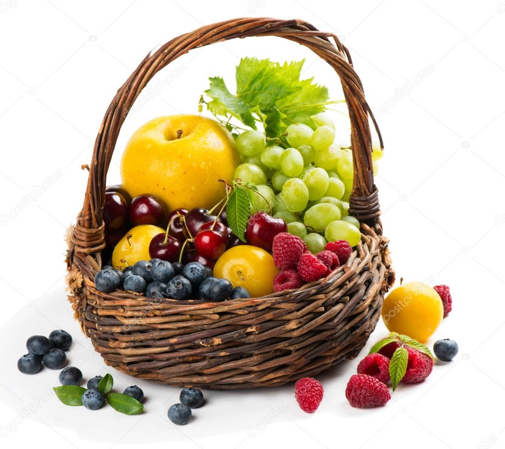   Assortment of fruits and berries in a basket