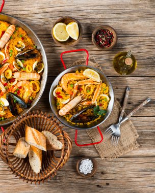 Spanish paella with mussels clipart