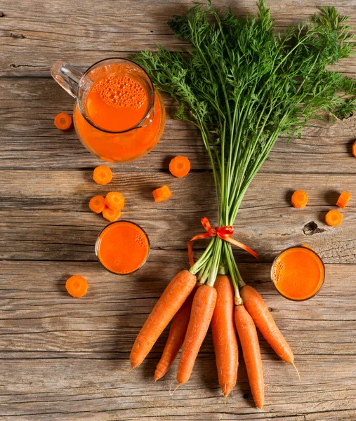 Carrot juice with fruit — Stock Photo, Image