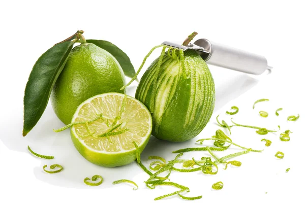 Zester with lime zest — Stock Photo, Image