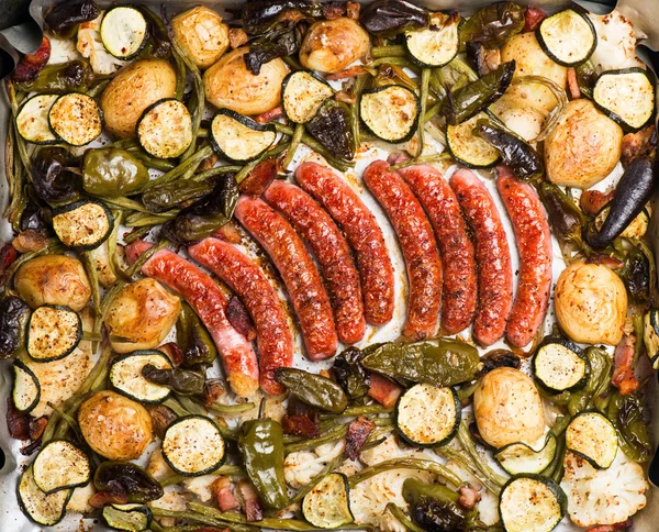 Bangers and vegetables — Stock Photo, Image
