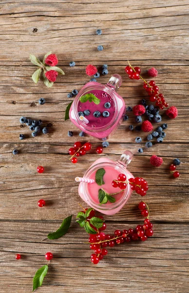 Two milkshakes of berry, shot from above. — Stock Photo, Image