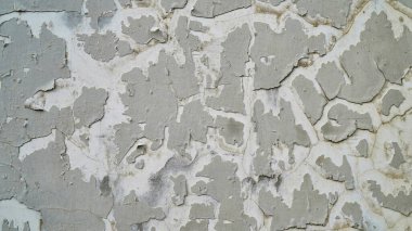 Kumaşın dokusu ve arkaplanı. Duvardaki soyulmuş boyanın eşsiz dokusu.