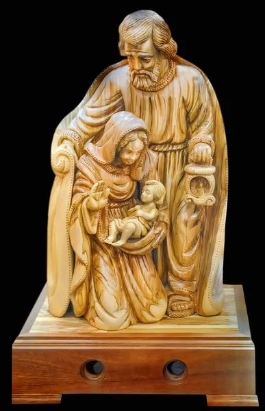 Uma família. José e a Bem-Aventurada Virgem Maria com o menino Jesus Cristo nos braços. Estatueta na loja da cidade de Belém, Palestina. 4 de outubro de 2013 — Fotografia de Stock