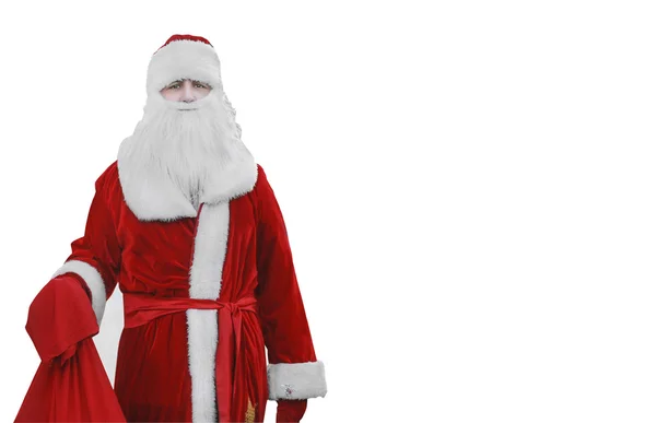 Weihnachtsmann mit einem Sack voller Geschenke auf weißem Hintergrund. Weihnachten und Neujahr. — Stockfoto