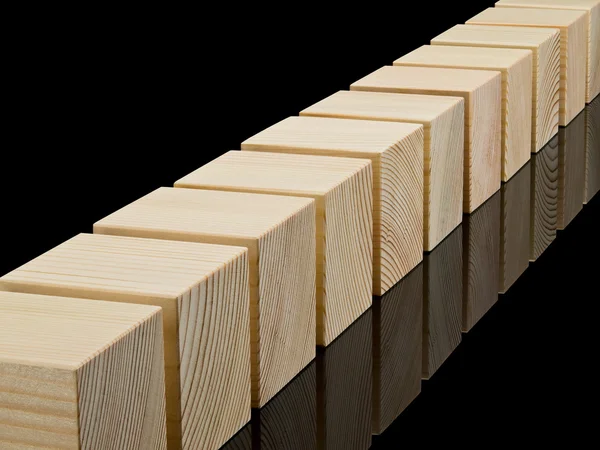 Tipo a longo prazo de alguns cubos de madeira — Fotografia de Stock