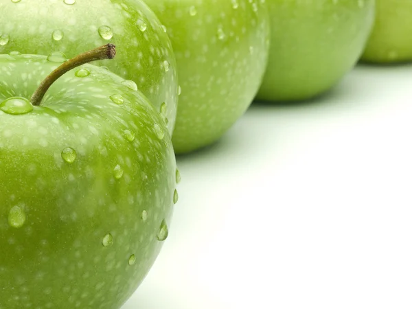 Fem grønne epler – stockfoto