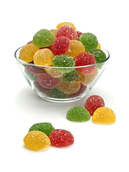 Glazen vaas met multi-gekleurde fruit candy Stockafbeelding