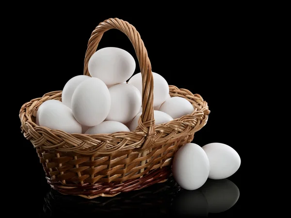 Basket full of white eggs — Stock Photo, Image