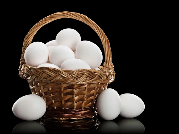 Basket full of white eggs — Stock Photo, Image