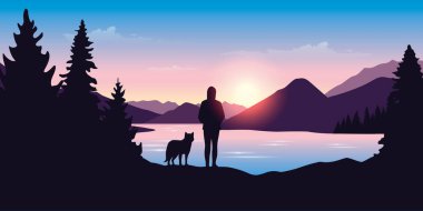 Gezgin kız ve köpek yeşil doğada nehrin kenarında