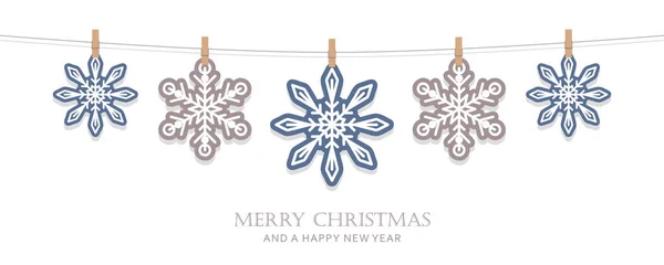 Blau und weiß hängende Schneeflocken Weihnachtskarte — Stockvektor