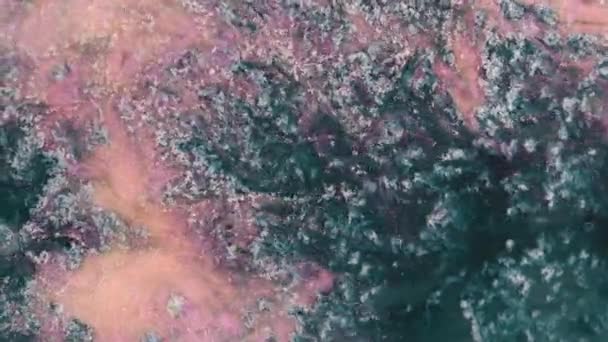 Flowing glitter waving surface. Flowing Golden abstract backdrop. Beautiful metallic texture paint close-up. Liquid slow motion Art. Colorful Chaos Turbulence. — Stock Video