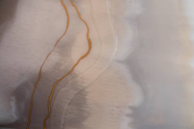 Tasarım kapağı, yıllık rapor, davetiye, el ilanı, sunum, ambalaj, poster, kartvizit, düğün davetiyesi için başvurulabilir. Renkli soyut epoksi reçine resminin makro fotoğrafı.