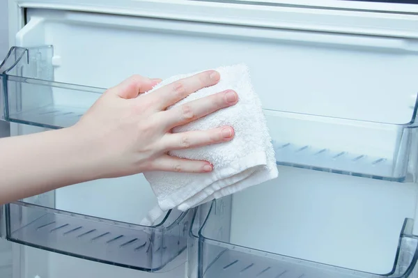 Caucasian Woman Hand Cotton Rag Washes Refrigerator Door — Stock Photo, Image