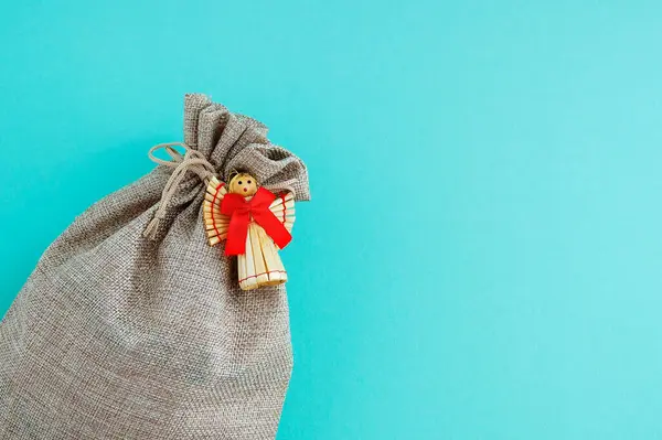 Brown Canvas Bag Ties Straw Angel Red Bow Close Turquoise — Stock Photo, Image