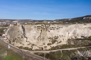 Cave complex at the fortress of Kalamita in Inkerman. Caves in the mountains near the monastery. Old Crimean caves.