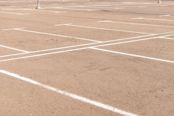 stock image Parking drawn on the asphalt. There are no cars in the parking lot. Empty parking lot during the day.