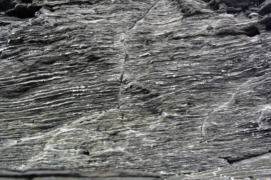 Siyah desenli taş, desen yakın plan.