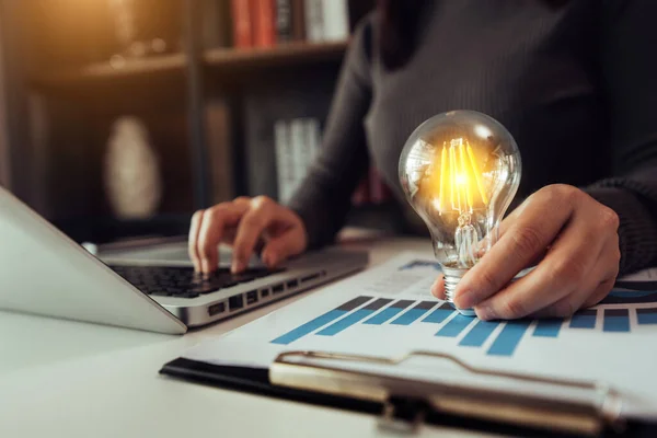 Business Woman Using Smartphone Tablet Holding Light Bulb Idea Innovation — Stock Photo, Image