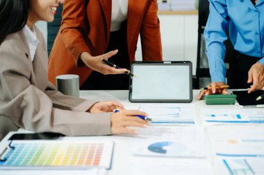 Team work process. Photo young business crew working with new startup project. Project managers meeting. Analyze plans, papers