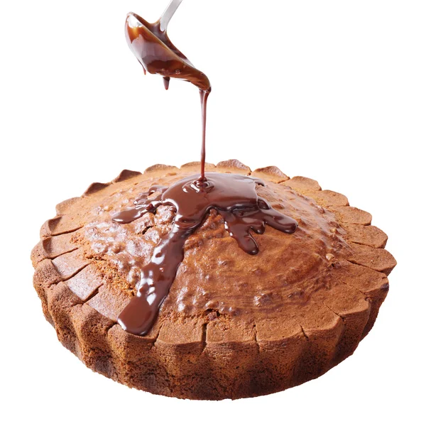 Einen Kuchen mit Schokolade gießen — Stockfoto