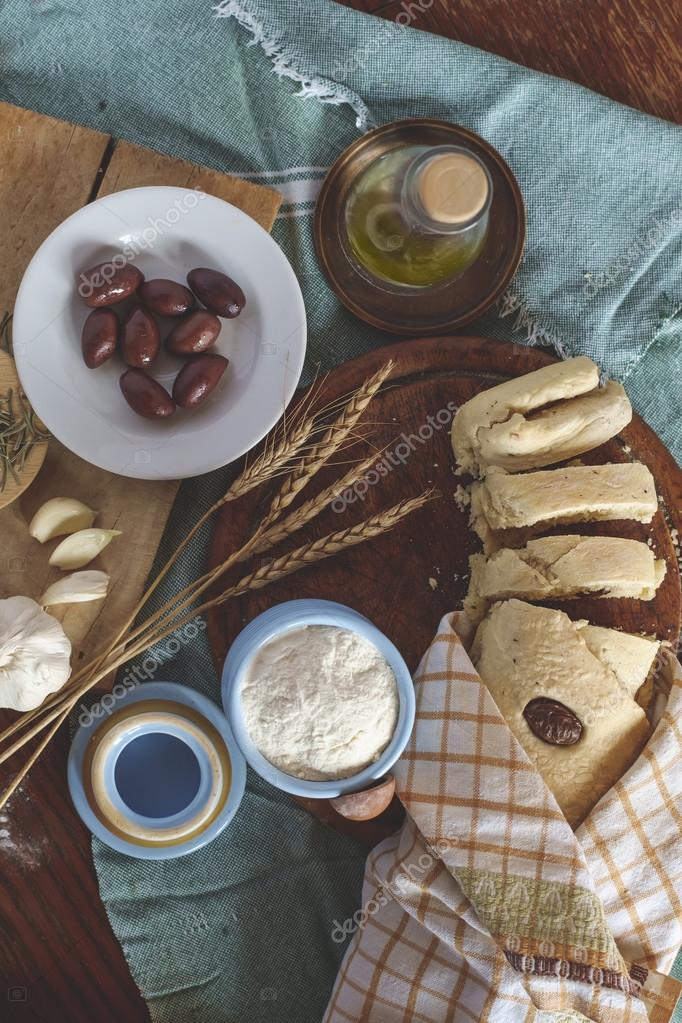 Mediterranean bread with ingredients — Stock Photo © studiomasina 98656820