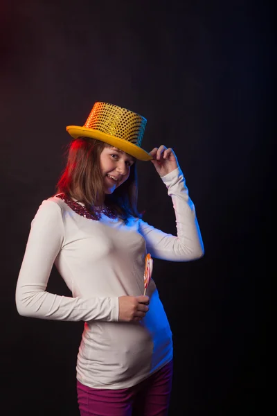 Teenage girl dancing on a black background — Stock Photo, Image