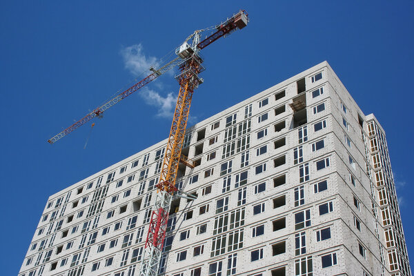 multi-storey building with a crane