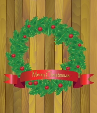 Holly ahşap arka plan üzerinde Noel çelenk