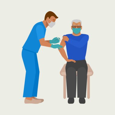 Yaşlılara aşı olmak. Hemşire yaşlı bir adama aşı enjekte ediyor.