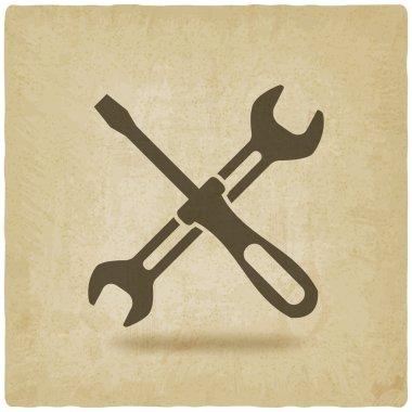 screw driver and wrench symbol old background