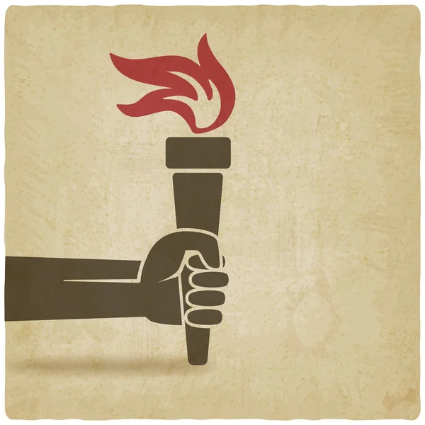 Main avec symbole de torche — Image vectorielle