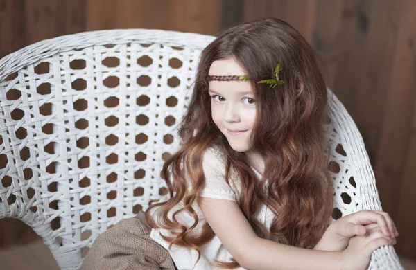 Smiling girl in captivity chair — Stock Photo, Image