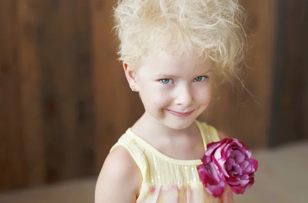 Smiling girl with blond hair — Stock Photo, Image