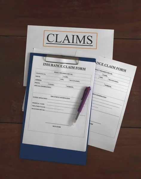Insurance Claim Form Put Wood Board Blurry Light — Stock Photo, Image