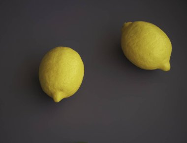 Arka planda sarı kabuklu iki limon