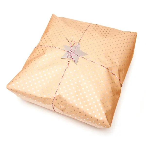 Gift wrapped parcel or present — Stock Photo, Image