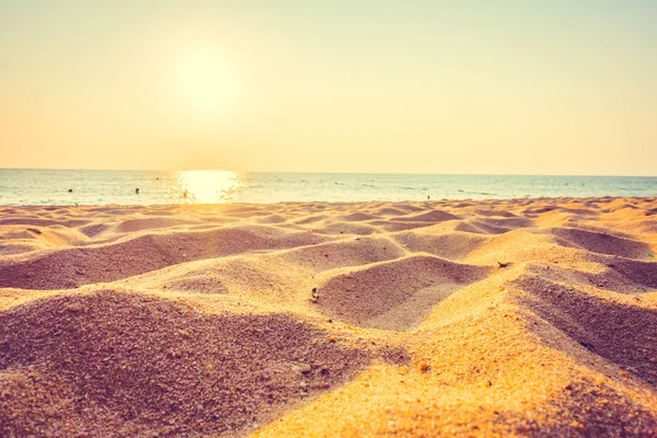 Hermoso mar y arena con puesta de sol —  Fotos de Stock