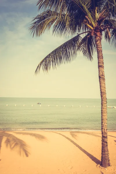 Beautiful beach and sea with palm tree